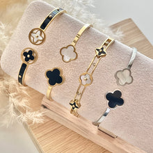 Load image into Gallery viewer, Black &amp; Gold Clover Bangle
